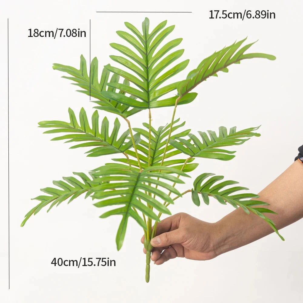 Artificial tropical monstera plant with decorative leaves for interiors