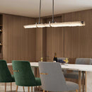 Modern stainless steel pendant light with minimalist crystal bar