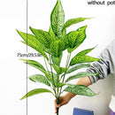 Artificial monstera plant with decorative tropical leaves for indoor garden