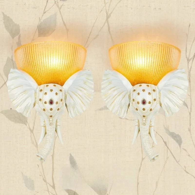 Decorative glass and resin elephant wall light