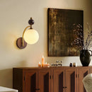 Wood and glass wall light for modern interiors
