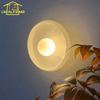 Minimalist Danish design round glass wall light for indoor use