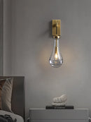Artistic copper water droplet wall light for interiors