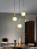 Minimalist and creative round marble all-copper chandelier