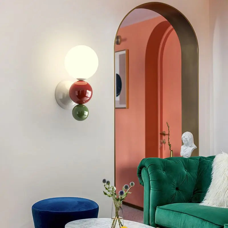 Metal LED wall light with acrylic ball