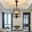 Vintage crystal chandelier with four arms for elegant lighting