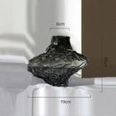 glass vase with decorative stones for flowers and terrarium