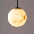 Nordic marble pendant light with elegant suspended globe