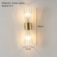 Modern stainless steel wall light with clear glass