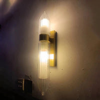 Clear glass wall light art deco style gold metal