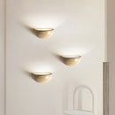 Modern wall light in pure natural yellow cave stone