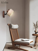 Rotatable decorative stone LED wall light