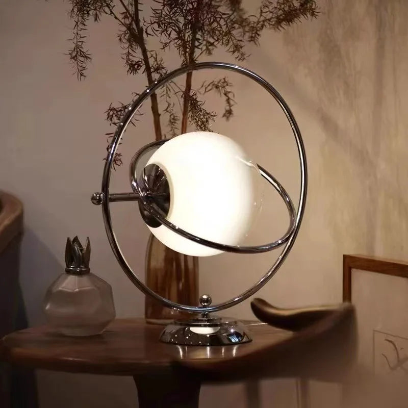 Scandinavian table lamp in chrome with glass globe