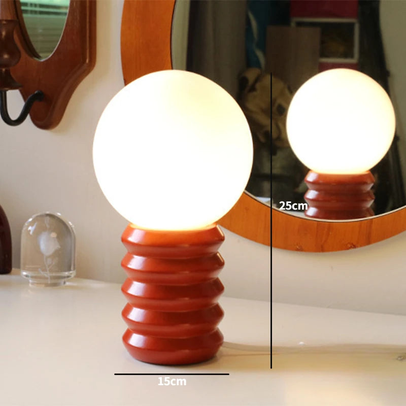 Designer glass table lamp for a warm atmosphere