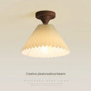 Modern LED ceiling light with wood and pleated fabric