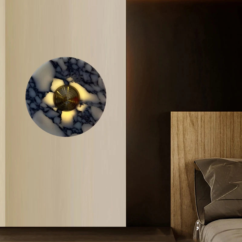 Art deco style wall light in stone and gold metal