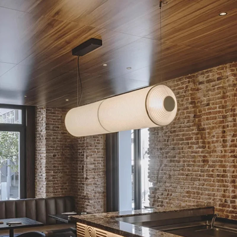 Cylindrical fabric pendant light for elegant interior decoration