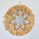 decorative mirror made of raffia and shells for wall decoration