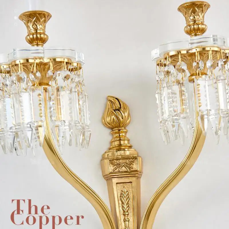 Copper and crystal wall light with LED candle for elegant interiors
