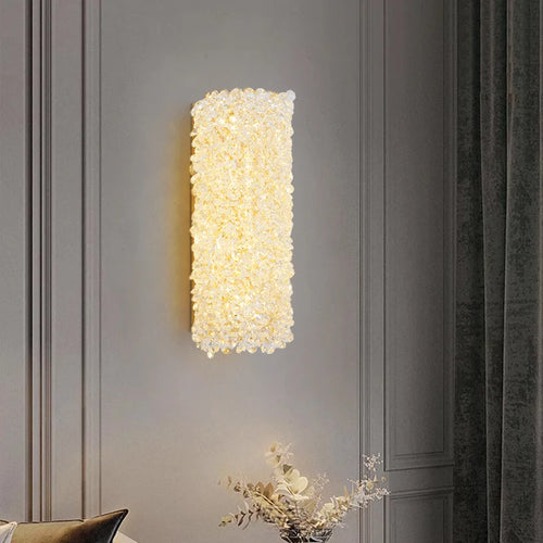 Gold metal wall light with clear crystal bulb and adjustable wire - vue 3 sur 9