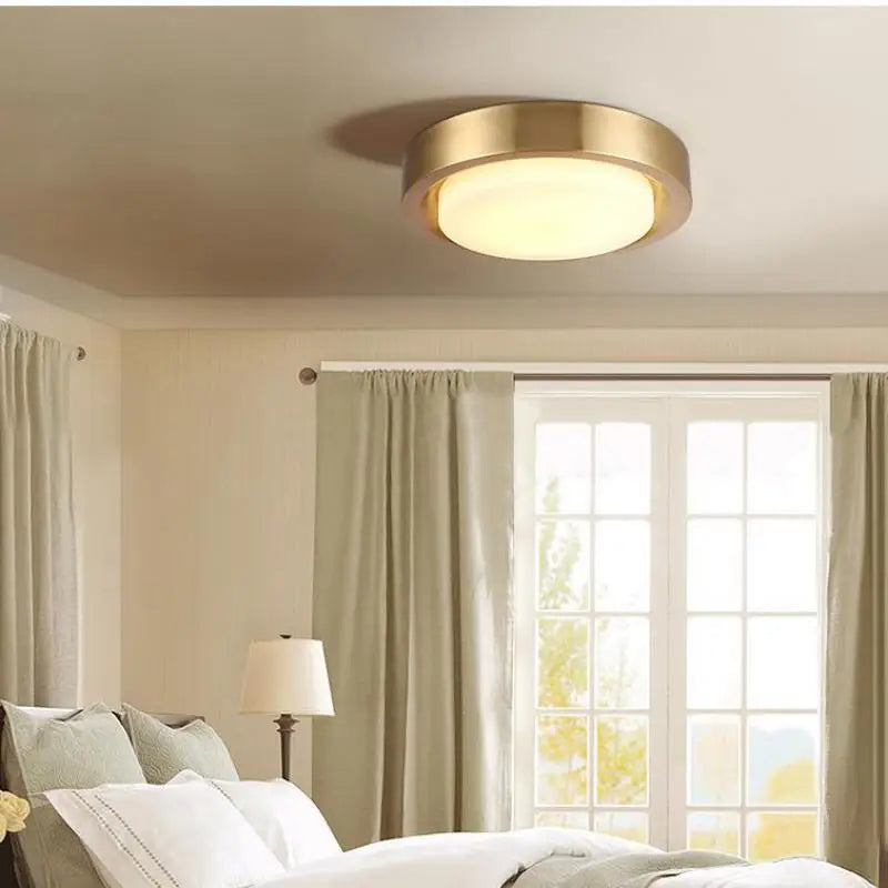 Round copper ceiling light with modern glass shade