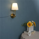 American retro wall light in black and gold linen