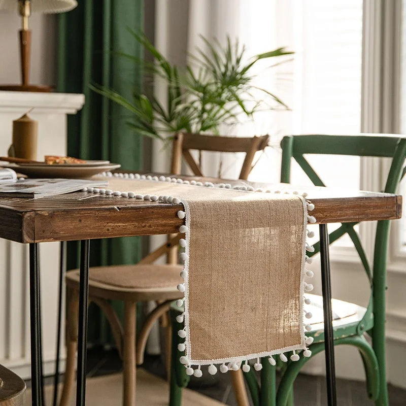 Beige country-style table runner with tassels