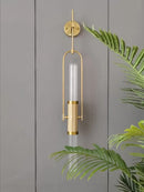 Art deco wall light in glass and gold metal with elegant design for interiors