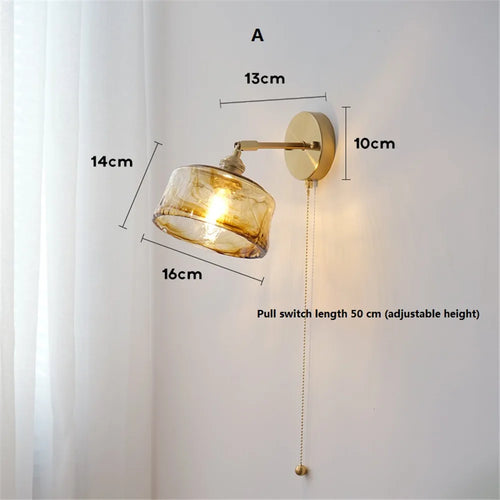 Retro rotating wall light in glass and copper with switch