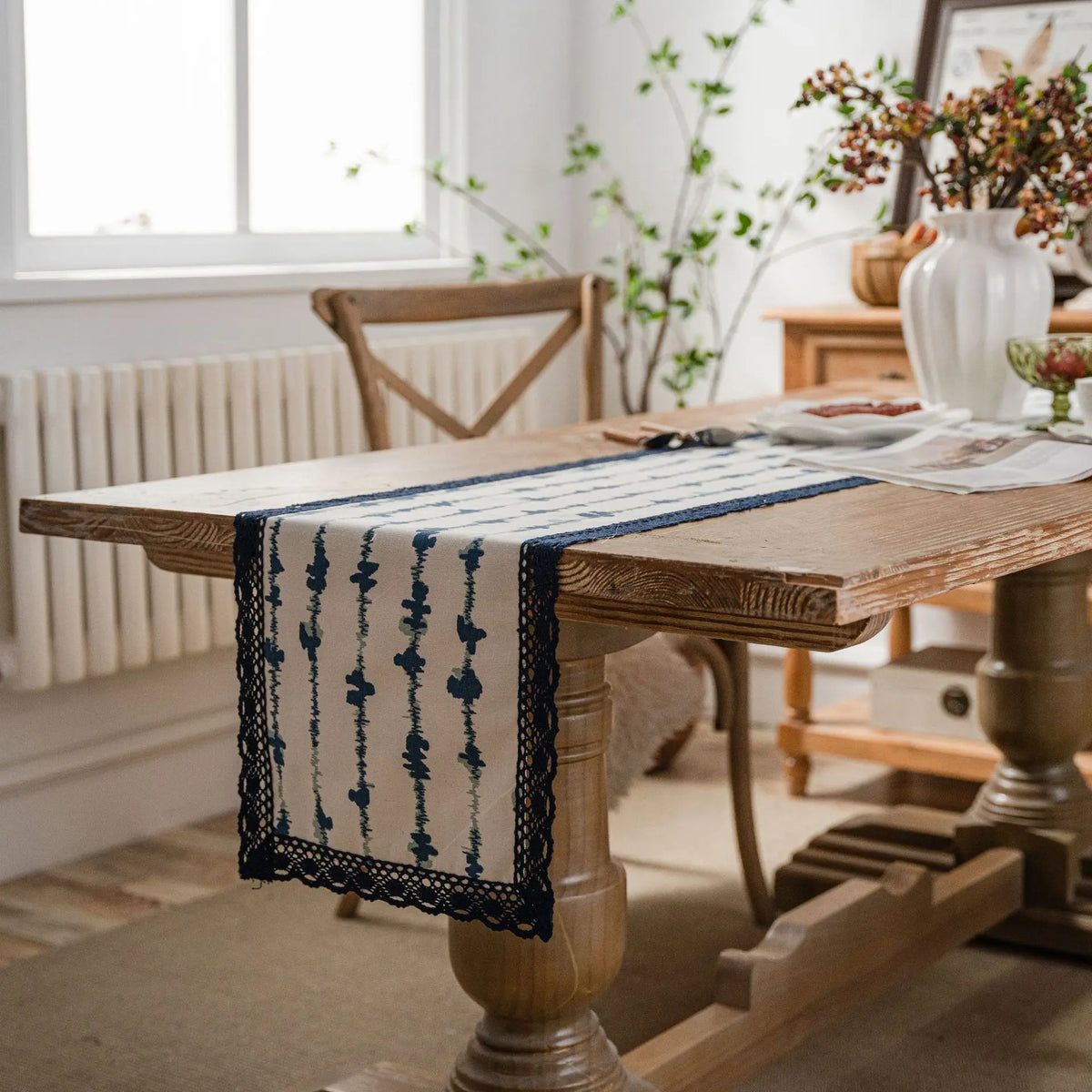 Navy blue countryside table runner with white lace