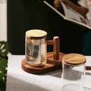 borosilicate glass mug with wooden handle and lid