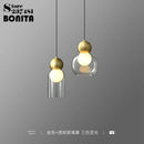 Transparent glass pendant light with decorative copper head