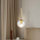 Modern glass pendant light with adjustable gold metal bulb