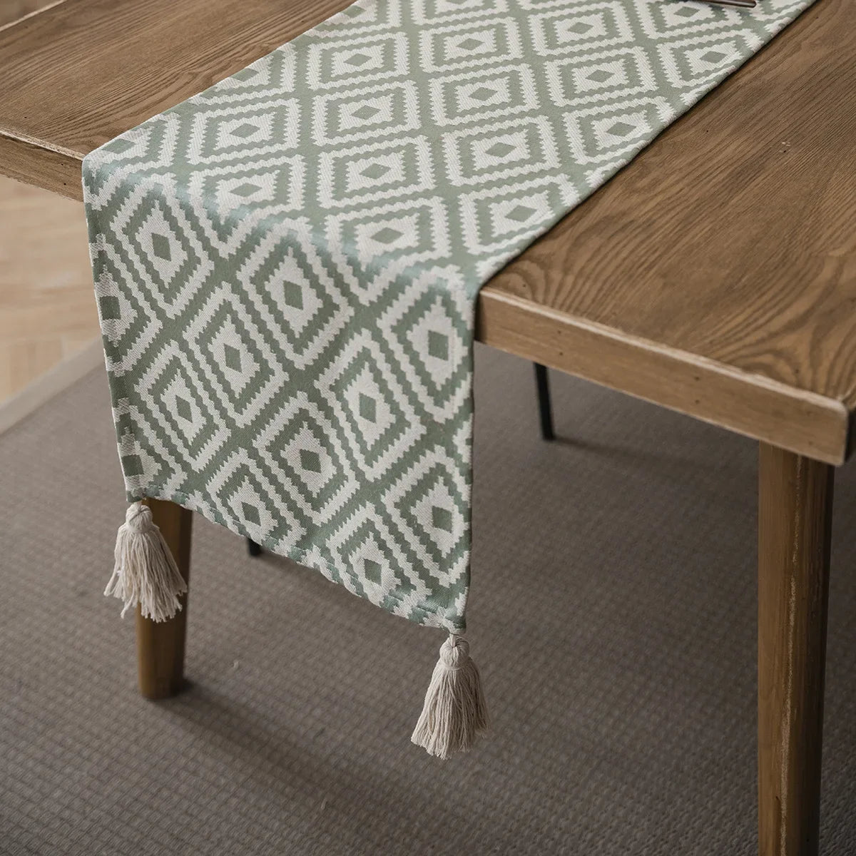 Boho beige table runner with geometric patterns and tassels
