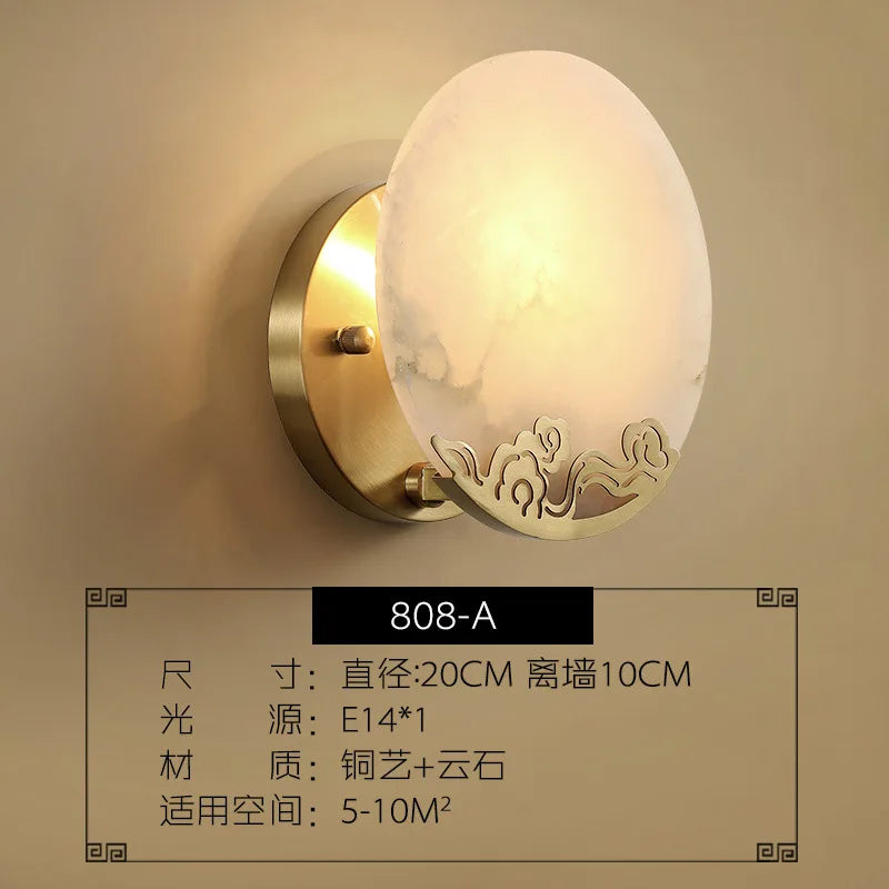 Copper wall light with marble shade and luxury mirror