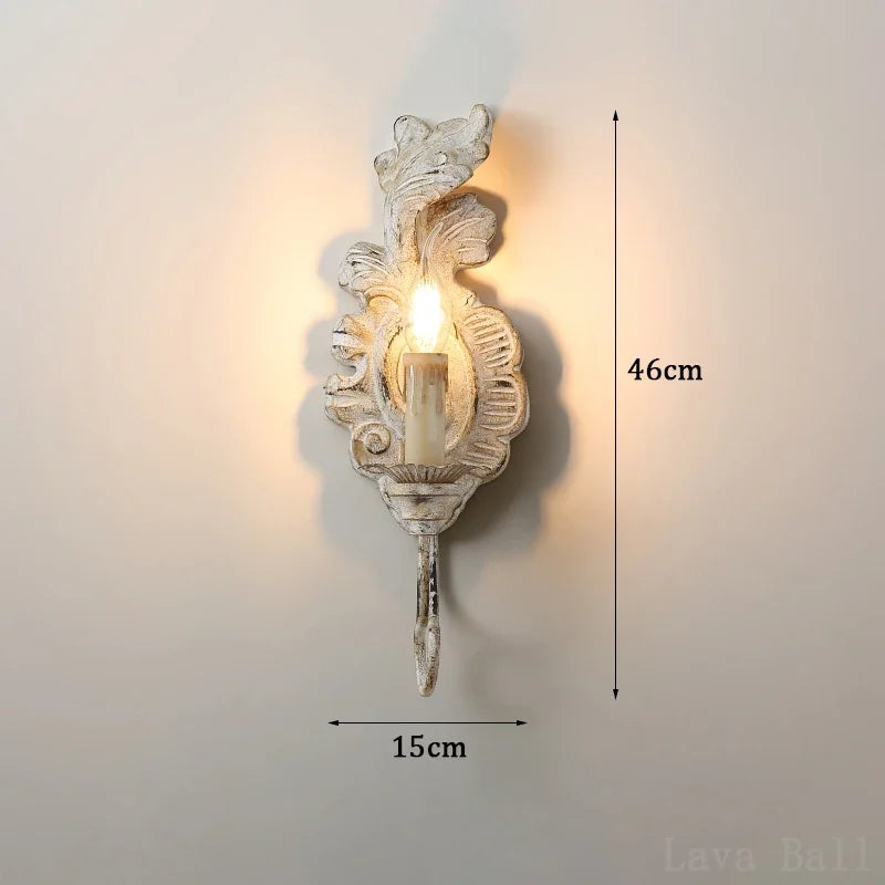 Vintage wall light in aged iron and wood for indoor decoration