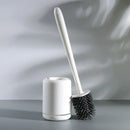 Wall-mounted toilet brush with convenient storage holder