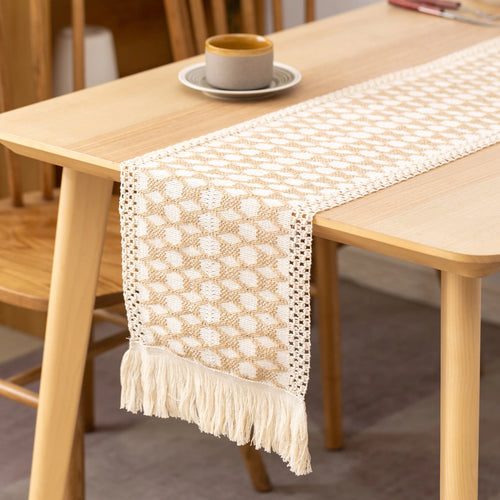 Boho beige table runner with geometric patterns and tassels