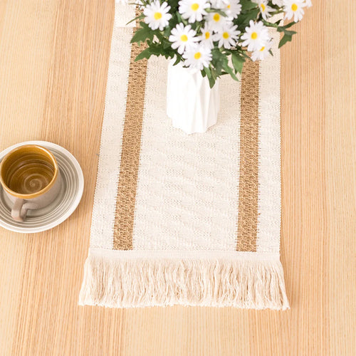 Boho beige table runner with geometric pattern and tassels