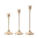 Brass gold candlestick set for festive decorations
