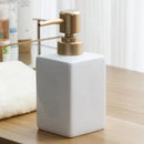 ceramic soap dispenser with gold pump for bathroom