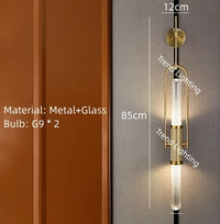 Art deco wall light in clear glass and gold metal for home lighting