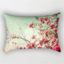 Rainbow cushion cover with red and pink flowers