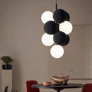 Pendant light with adjustable cord and PVC sphere