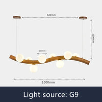 Solid wood and glass pendant light