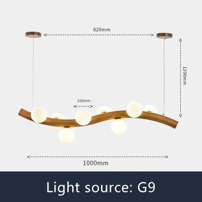 Solid wood and glass pendant light