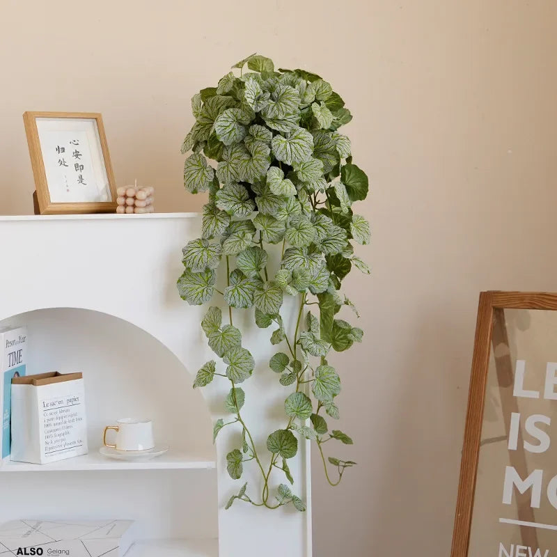 Artificial hanging plants begonia and silk fern vines