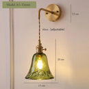 Vintage glass wall light with brass socket