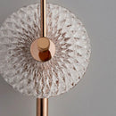 Round glass LED wall light in metal for ambient lighting