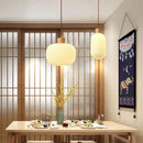 Glass pendant light with Nordic wood detail